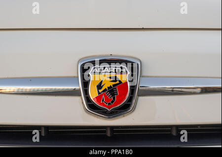 Fiat Abarth badge on the front of a Fiat 500 Abarth. Stock Photo