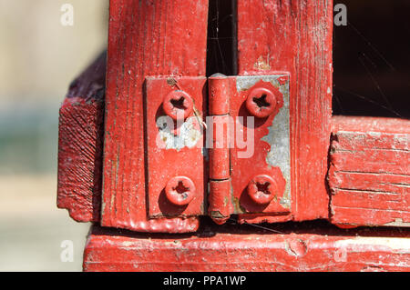 Rustic hinge on wooden box Background . close up Stock Photo