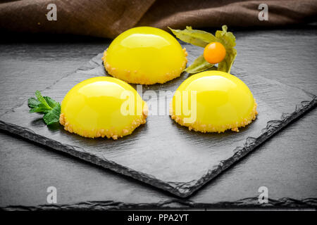 Trendy mousse cake with mirror glaze decorated. Stock Photo