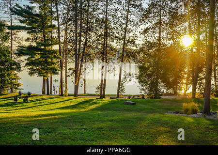 Sunset at Cottage or weekend homes in Dwight , Ontario, Canada, near Lake of Bayswith beautiful sand beach, Stock Photo