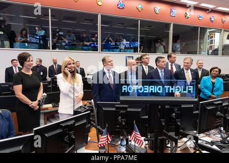 Ivanka Trump, daughter of President Donald Trump, center left, speaks to the crew aboard the International Space Station during a visit to the Mission Control Center at the Johnson Space Center September 20, 2018 in Houston, Texas. Stock Photo