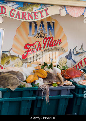 Fresh fish and seafood on display at a colourful stall during Plymouth Seefood festival 2018 Stock Photo