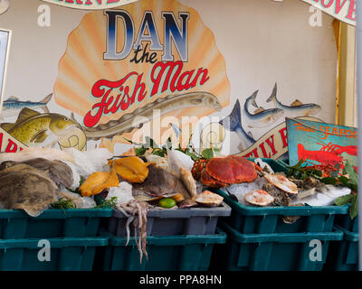 Fresh fish and seafood on display at a colourful stall during Plymouth Seefood festival 2018 Stock Photo