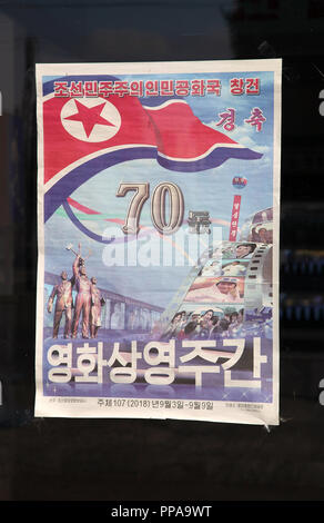 70th Anniversary of DPR Korea poster in a Pyongyang window Stock Photo