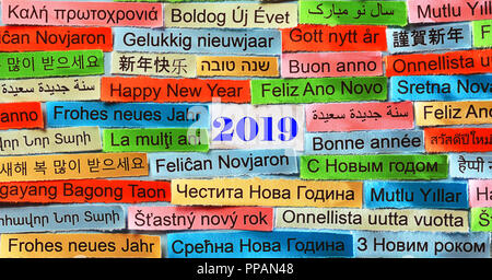 Happy New Year  2019 Word Cloud printed on colorful paper different languages Stock Photo