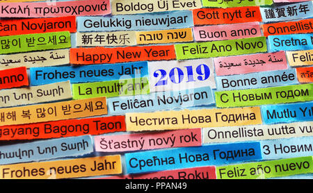 Happy New Year 2019 Word Cloud printed on colorful paper different languages Stock Photo