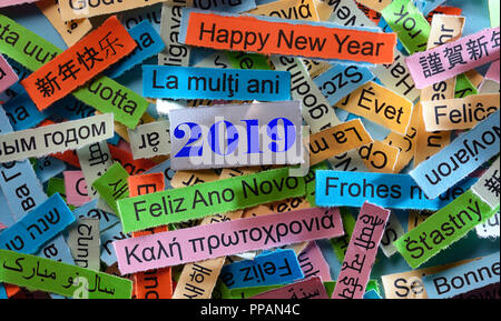 Happy New Year 2019 Word Cloud printed on colorful paper different languages Stock Photo