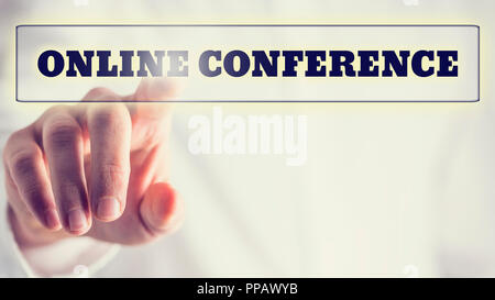 Online conference on a virtual interface in a navigation bar with a businessman touching it with his finger from behind, vintage effect toned image. Stock Photo