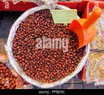 Dried rose hips in the basket Stock Photo
