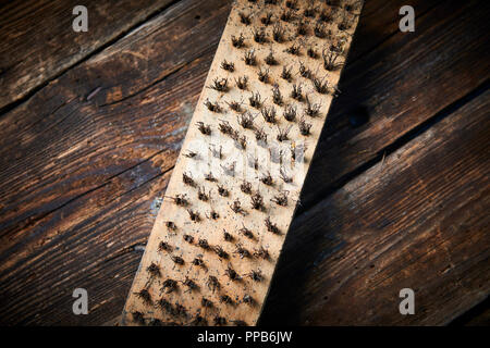 Rusty steel brush close up. Selective focus Stock Photo