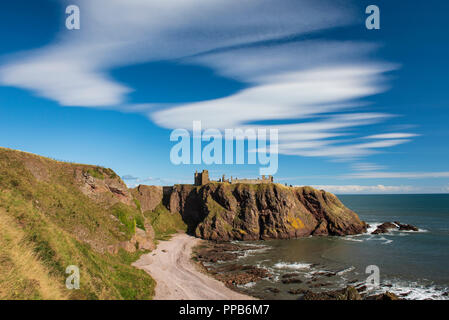 Dunnottar Castle is located on a rocky headland south of Stonehaven, Aberdeenshire, Scotland. Stock Photo