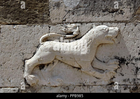 Byzantine Art. Relief depicting a lion on the facade of the Church of St. Nicholas, built in the 13th century and remodeled in 18th and 19th centuries. Mesopotam. Albania. Stock Photo