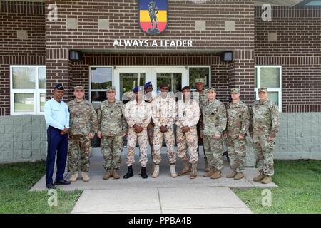 Members of the Djiboutian military visit with Kentucky Guardsmen during a leadership exchange as part of the State Partnership Program in Greenville, Ky., Aug. 16, 2018. Kentucky Guardsmen shared training fundamentals and ideas with instructors from the Djiboutian Armed Forces. Stock Photo