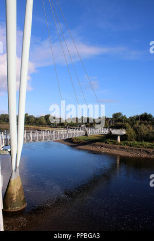 Lune Millennium Bridge over the River Lune in Lancaster, Lancashire is a cable-stayed footbridge that is part of the National Cycle Network, Route 6. Stock Photo