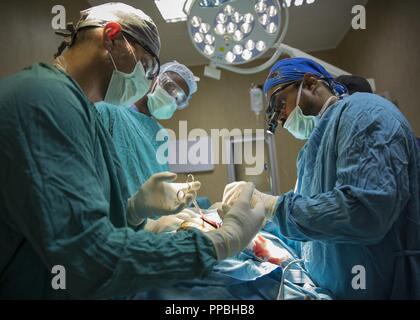 Operating Room Discards U.S. Army Sgt. Anthony Triolo, an operating room specialist assigned to ...