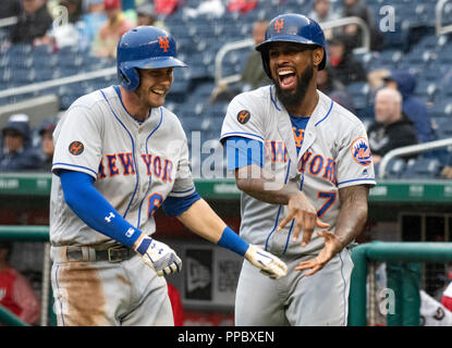 Washington, United States Of America. 23rd Sep, 2018. New York Mets second baseman Jeff McNeil (68) and pinch hitter Jose Reyes (7) celebrate after scoring in the fourth inning against the Washington Nationals at Nationals Park in Washington, DC on Sunday, September 23, 2018. Credit: Ron Sachs/CNP (RESTRICTION: NO New York or New Jersey Newspapers or newspapers within a 75 mile radius of New York City) | usage worldwide Credit: dpa/Alamy Live News Stock Photo