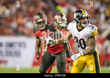 Tampa, Florida, USA. 24th Sep, 2018. Tampa Bay Buccaneers linebacker Lavonte David (54) looks to defend against Pittsburgh Steelers running back James Conner (30) during the game at Raymond James Stadium on Monday September 24, 2018 in Tampa, Florida. Credit: Travis Pendergrass/ZUMA Wire/Alamy Live News Stock Photo