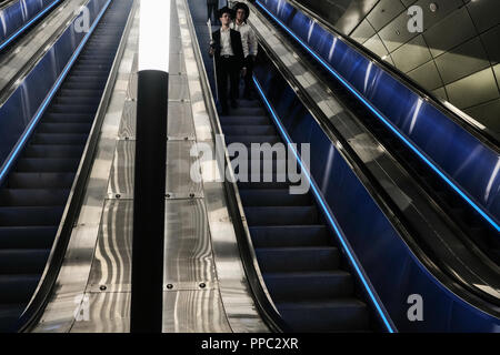 Jerusalem, Israel. 25th September, 2018. Commuters navigate Jerusalem's new Yitzhak Navon Station, with platforms situated 80m below ground level. The new Jerusalem Tel Aviv 'King David' train line, Israel Rail Project A1, designed to connect Israel's capital to the Greater Tel Aviv metropolitan area, begins commercial operation today. Credit: Nir Alon/Alamy Live News Stock Photo