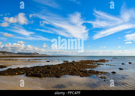 Lyme Regis, Dorset, UK.  25th September 2018. UK Weather.   The beach at low tide at the seaside resort of Lyme Regis in Dorset on a day of warm autumn sunshine.  Picture Credit: Graham Hunt/Alamy Live News Stock Photo