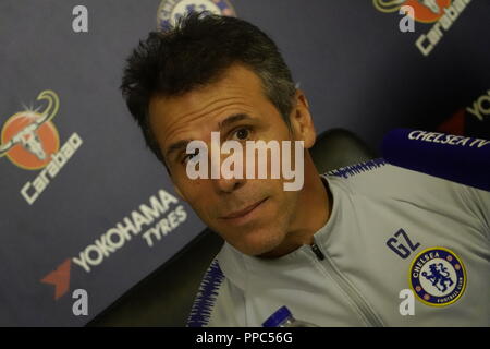 Cobham, UK. 25th September, 2018.   Cobham, Surrey, UK  Assistant Chelsea Football Club manager, Gianfranco Zola, answers  media questions prior to his teams Carabao Cup match on Wednesday against Liverpool FC at Anfield. Credit: Motofoto/Alamy Live News Stock Photo