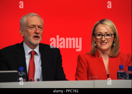Liverpool, England. 25th September, 2018.  Labour Party leader Jeremy Corbyn and Rebecca Long-Bailey, Shadow Secretary of State for Business, Energy and Industrial Strategy, acknowledging applause from the delegates following her speech on the theme of 'Brexit and the Economy', to conference, on the morning session of the third day of the Labour Party annual conference at the ACC Conference Centre.  Kevin Hayes/Alamy Live News Stock Photo