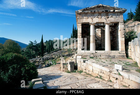 Greek Art. Greece. Delphi. The Athenian Treasury. Built in Parian marble. Its construction ranging from 510 to 480 B.C. The metopes are reproductions. The originals are kept in the museum of Delphi. Stock Photo