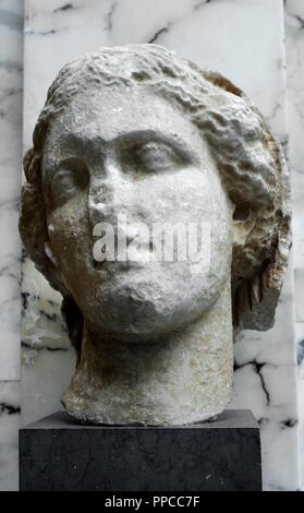 Head of a woman from colossal statue, probably depicting Goddess Demeter mourning his daughter Kore-Persefone. Greek original. C. 350 BC. Marble. Museum of Mediterranean and Near Eastern Antiquities. Stockholm. Sweden. Stock Photo