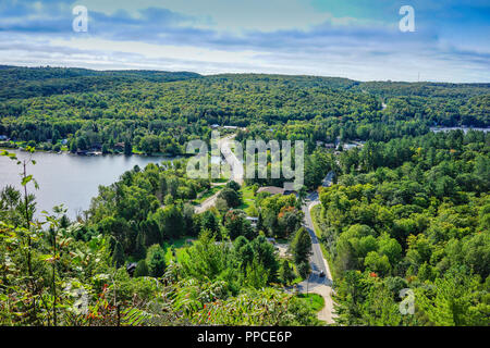 Sunset at Cottage or weekend homes in Dwight , Ontario, Canada, near Lake of Bayswith beautiful sand beach, Stock Photo