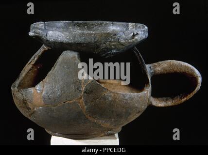 Italy. Sardinia. Nuragic civilization. Ceramic stove used for cooking. 8th century BC. Archeological Museum of Cagliari. Stock Photo