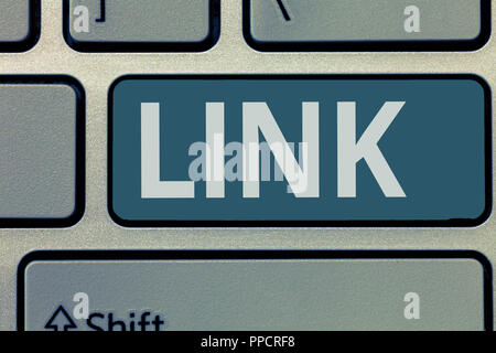 Text sign showing Link. Conceptual photo Loop in a chain Network of routes between webpages Connection. Stock Photo