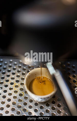 Coffee machine filling cup, Seattle, Washington, USA Stock Photo