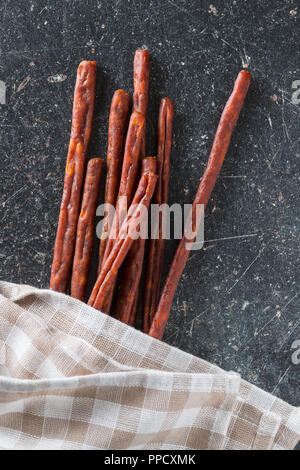 Sausage sticks snack. Chorizo snack. Stock Photo