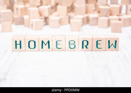 The Word Homebrew Formed By Wooden Blocks On A White Table Stock Photo