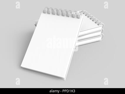 Pile of white hard cover notebooks in 3d rendering on light grey background, elevated view Stock Photo