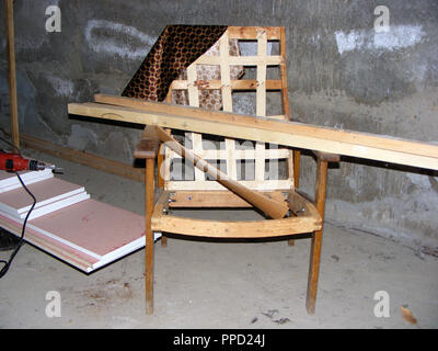 Old broken wooden chair in the park near the river Stock Photo - Alamy