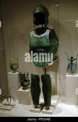 Greek art. Magna Graecia. Bronze helmet, cuirass and shin guard. Muzzle and horse armor. Apulia Region (Southern Italy). Metropolitan Museum of Art. New York. United States. Stock Photo