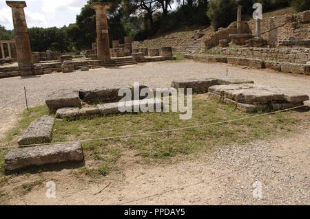 Olympia. Temple of Hera. It was built aound 600 BC. View of the altar. The torch of the Olympic flame is lit in its ruins since 1936. Elis region, Peloponnese, Greece. Stock Photo