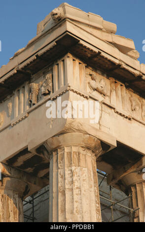 Greek Art. Parthenon. Was built between 447-438 BC. in Doric style under leadership of Pericles. The building was designed by the architects Ictinos and Callicrates.  Detail of entablature (frieze with triglyps and metopes, architrave, capital with abacus, echinus and necking. Acropolis. Athens. Attica. Central Greek. Europe. Stock Photo