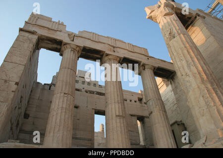 Greek Art. The Propylaea. In 437 BC Mnesicles started building the monument gates with columns of Pentelic marble. (437-432 BC). Acropolis. Athens. Attica. Central Greece. Europe. Stock Photo