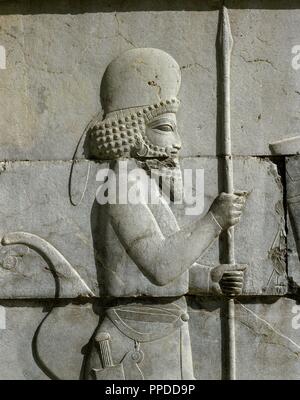 Achaemenid Empire. Persepolis. Relief of a Mede soldier (round cap), detail . The tripylon or Central Palace. 5th century BC. Iran (Persia). Stock Photo
