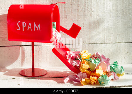 Full red mailbox of spam problem abstract on white background Stock Photo