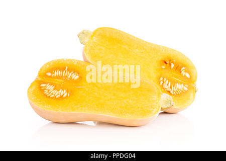 Group of two halves of smooth pear shaped orange butternut squash waltham variety one cut in two section isolated on white background Stock Photo