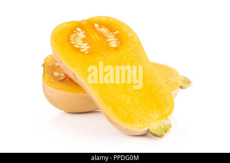 Group of two halves of smooth pear shaped orange butternut squash waltham variety isolated on white background Stock Photo