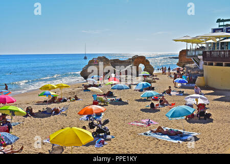 Olhus d'Agua is located on the Algarve coast of southern Portugal. The beautiful beach is very popular with tourists and locals. Stock Photo