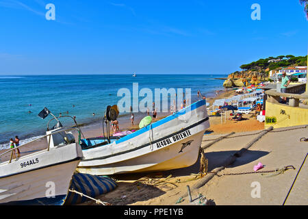 Olhus d'Agua is located on the Algarve coast of southern Portugal. Fishing boats are stored towards one end of the pretty, sandy beach Stock Photo