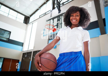 Portrait Of Female High School Basketball Team Coach Stock Photo