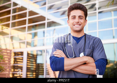 Young Hispanic male healthcare worker outdoors, portrait Stock Photo