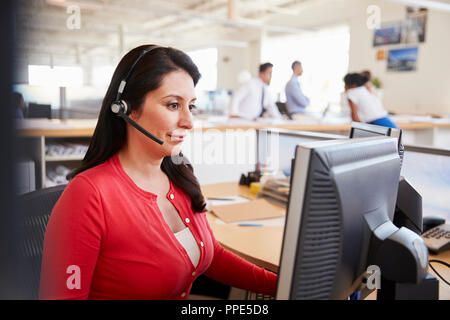 Hispanic woman working in a call centre Stock Photo