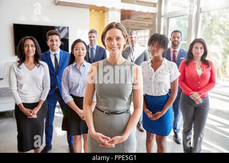 White businesswoman and her business team, group portrait Stock Photo