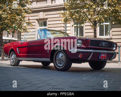 VILNIUS, LITHUANIA-JUNE 10, 2017: 1966 Ford Mustang Convertible (first generation) at the city streets. Stock Photo